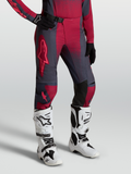 Alpinestars Stella Techstar Swan Pants, women's motocross gear, crimson and dark gray, worn with white Tech 10 boots.