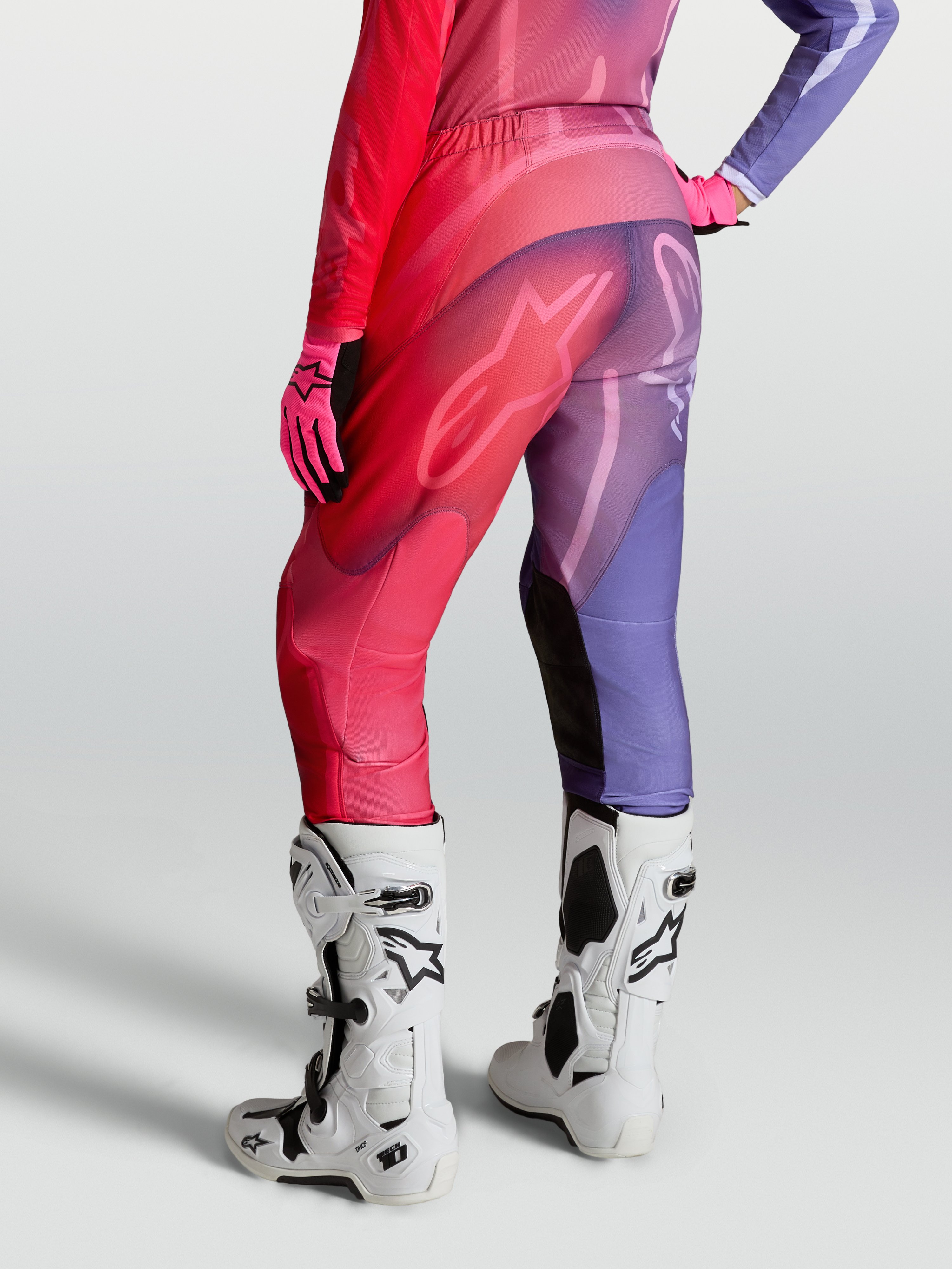 Alpinestars Stella Fluid Kepler Pants, women's purple and red motocross pants with pre-curved legs and stretch panels.