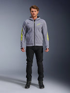 Alpinestars Chrome V2 Sport Hoodie, Gray Heather with Fluorescent Yellow accents, urban motorcycle apparel, featured with black pants and black riding shoes, technical fleece with bold yellow branding on sleeves and chest, casual street style for riding