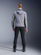 Alpinestars Chrome Air Sport Hoodie, Gray Heather Black, back view of motorcycle riding hoodie featuring green high-flow mesh panels on the sides and sleeves, tech fleece construction with Alpinestars branding on the hood, worn with black pants