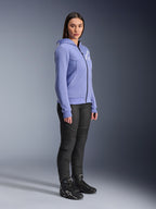 Alpinestars Woman Stella Chrome V2 Sport Hoodie, motorcycle hoodie in blue-violet with white Alpinestars logo on the chest, worn by a model with black riding pants and black motorcycle boots, urban riding apparel for women