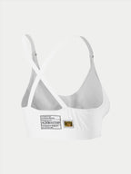 Alpinestars Stella TECH ZX Bra, white flame-resistant racing underwear, rear view showing cross-back strap design, features FIA 8856-2018 homologation label and hologram, lightweight performance base layer for women