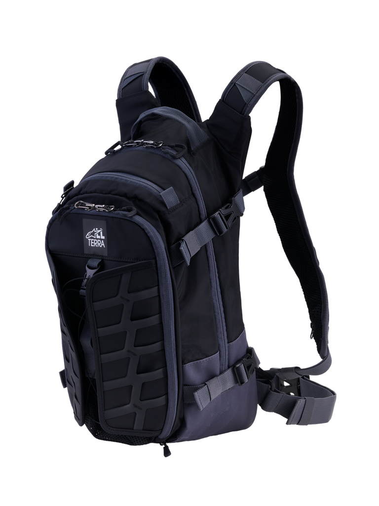 Alpinestars AT-15 Back Pack, technical motorcycle backpack, Black and Deep Gray, featuring a rugged front MOLLE panel, adjustable compression straps, padded shoulder straps with magnetic chest lock, and All Terra logo, designed for adventure off-road riding
