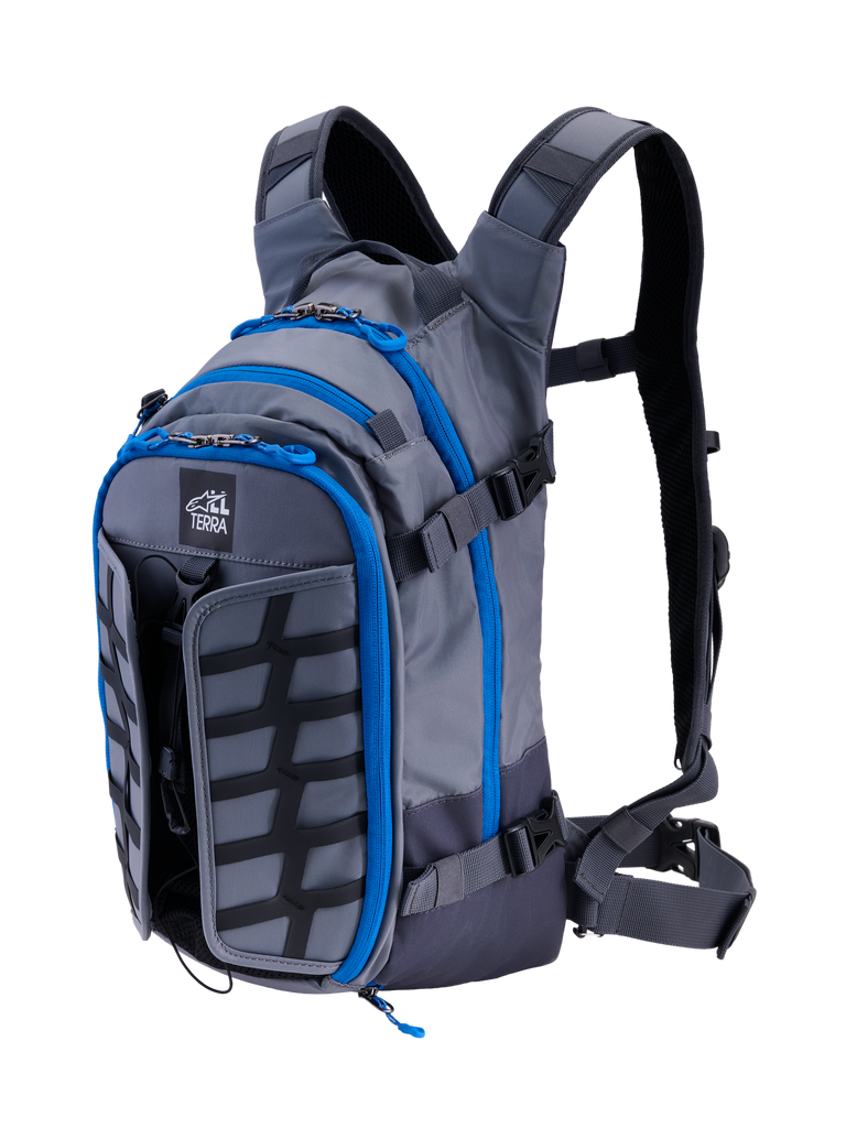 Alpinestars AT-15 Back Pack, Adventure Motorcycle Backpack, Dark Gray and Deep Gray with bright blue zipper trim, front-quarter view showing the 'ALL TERRA' logo, expandable front panel, and technical ergonomic strap system.