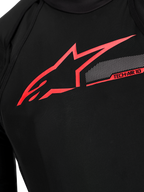 Tech-Air 10 V2 Race Airbag System chest detail, black technical fabric with bright red Alpinestars logo and tech graphics.