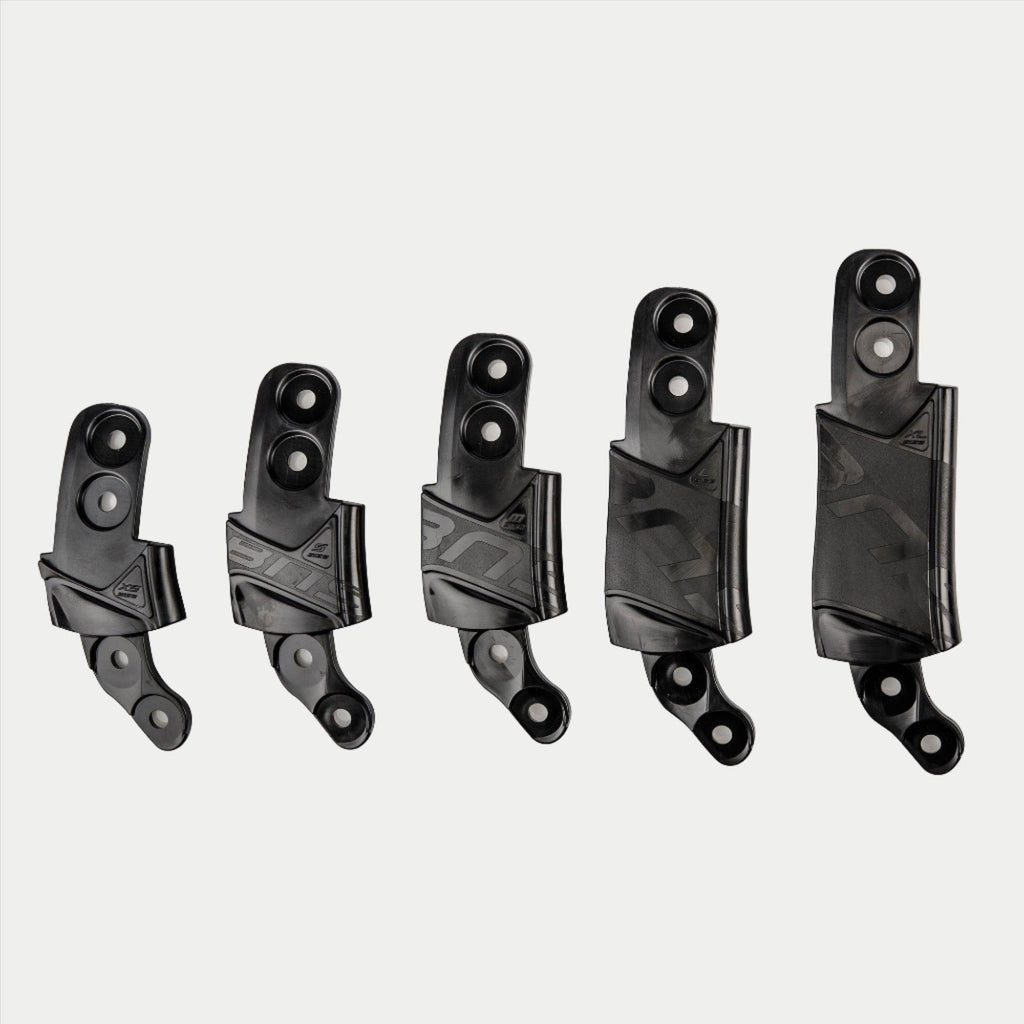 Alpinestars BNS Size Adapter Kit, Helmet and Neck Support Accessory, Five black plastic adapter components in graduated sizes, modular design for fit adjustment with mounting holes and textured branding, solid black color