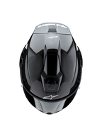 Alpinestars Supertech R10 Solid Helmet, Top View, Black Carbon Matte and Glossy, showing carbon fiber texture on sides, glossy center section, aerodynamic vents, and white Alpinestars logo on front and rear