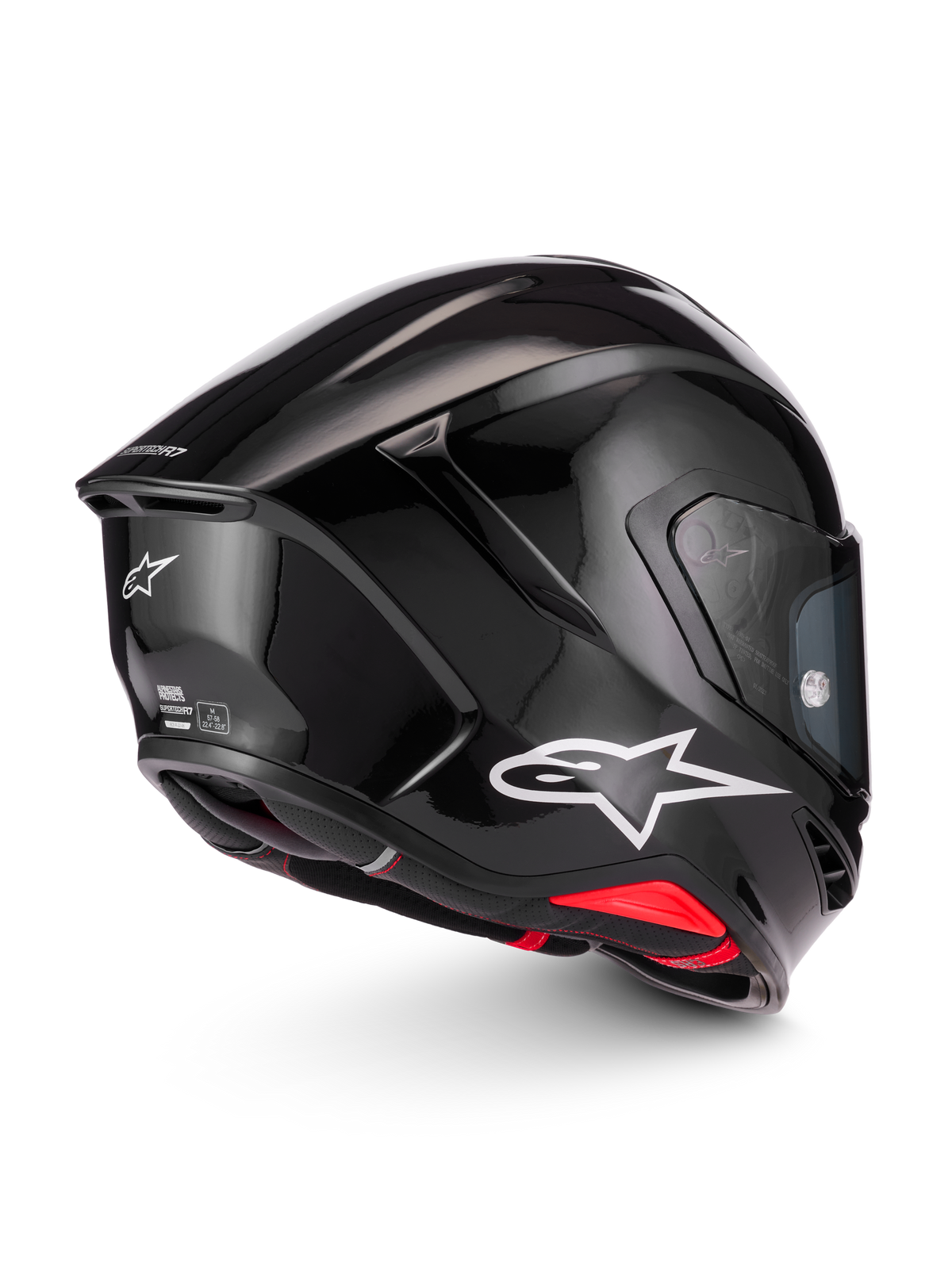 Alpinestars Supertech R7 Solid Helmet, black glossy motorcycle helmet featuring aerodynamic shell design, white Astar logo, and ECE/DOT certification details