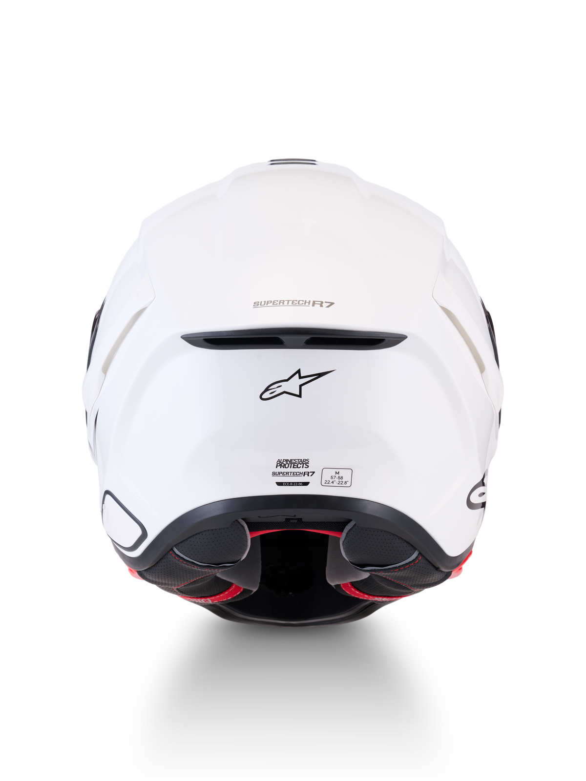 Alpinestars Supertech R7 Solid Helmet, motorcycle road helmet, White Glossy, rear view showing carbon composite construction, ventilation exhaust port, A-star logo, and ECE 22.06 certification label