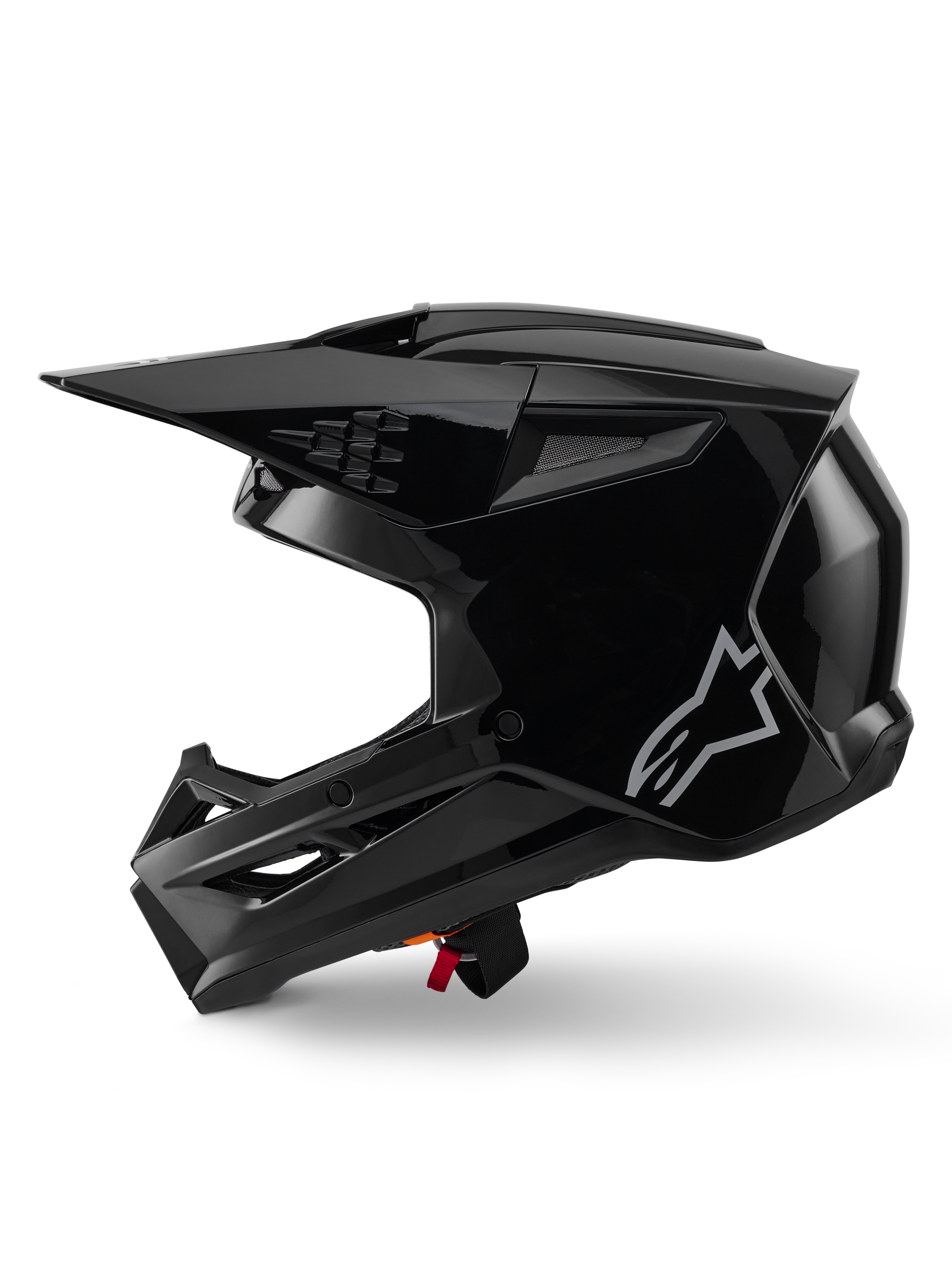 Alpinestars S-M3 Solid Helmet, Motocross Helmet, Black Glossy, side profile view, featuring a silver Alpinestars logo, aerodynamic visor, and multiple ventilation ports for off-road racing