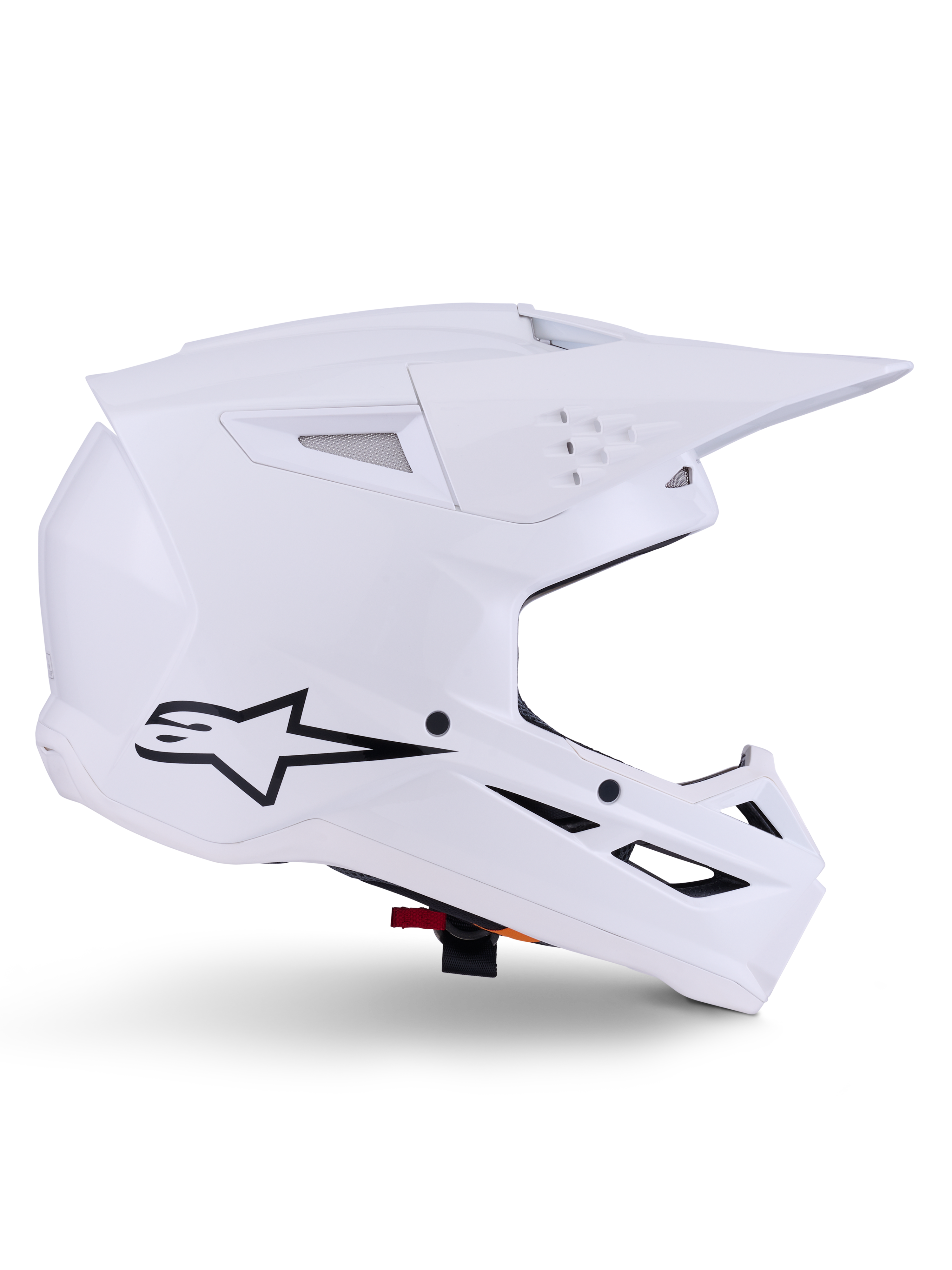Alpinestars S-M3 Solid Helmet, Motocross Helmet, Glossy White, side profile view with black star logo, angular aerodynamic shell, multiple ventilation ports, integrated visor and chin guard, off-road racing protection