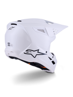 Alpinestars S-M3 Solid Helmet, Motocross Helmet, White Glossy, rear three-quarter view showing black Alpinestars logo, ventilation ports, and aerodynamic shell design for off-road racing.