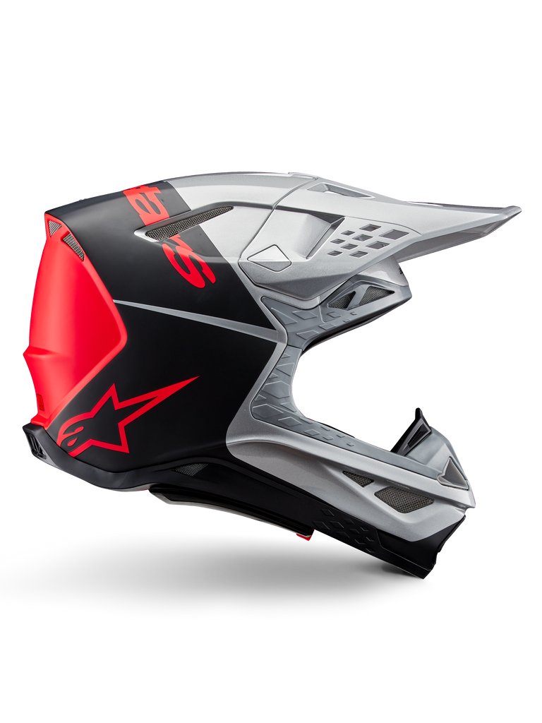 Alpinestars Supertech M10 Flood ECE 22.06 Helmet, Motocross Helmet, Silver Black and Orange Fluo, matte and glossy finish, aerodynamic profile with multi-composite shell, bold branding with orange Alpinestars logo, high-flow ventilation ports and protective visor