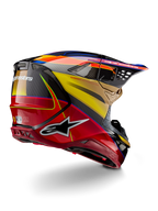 Alpinestars Supertech M10 Era Helmet, Motocross Helmet, Gold Yellow Rio Red Glossy, rear three-quarter view showing carbon fiber shell with red and yellow graphics, blue accents, aerodynamic profile with multiple ventilation ports and bold Astar logo.