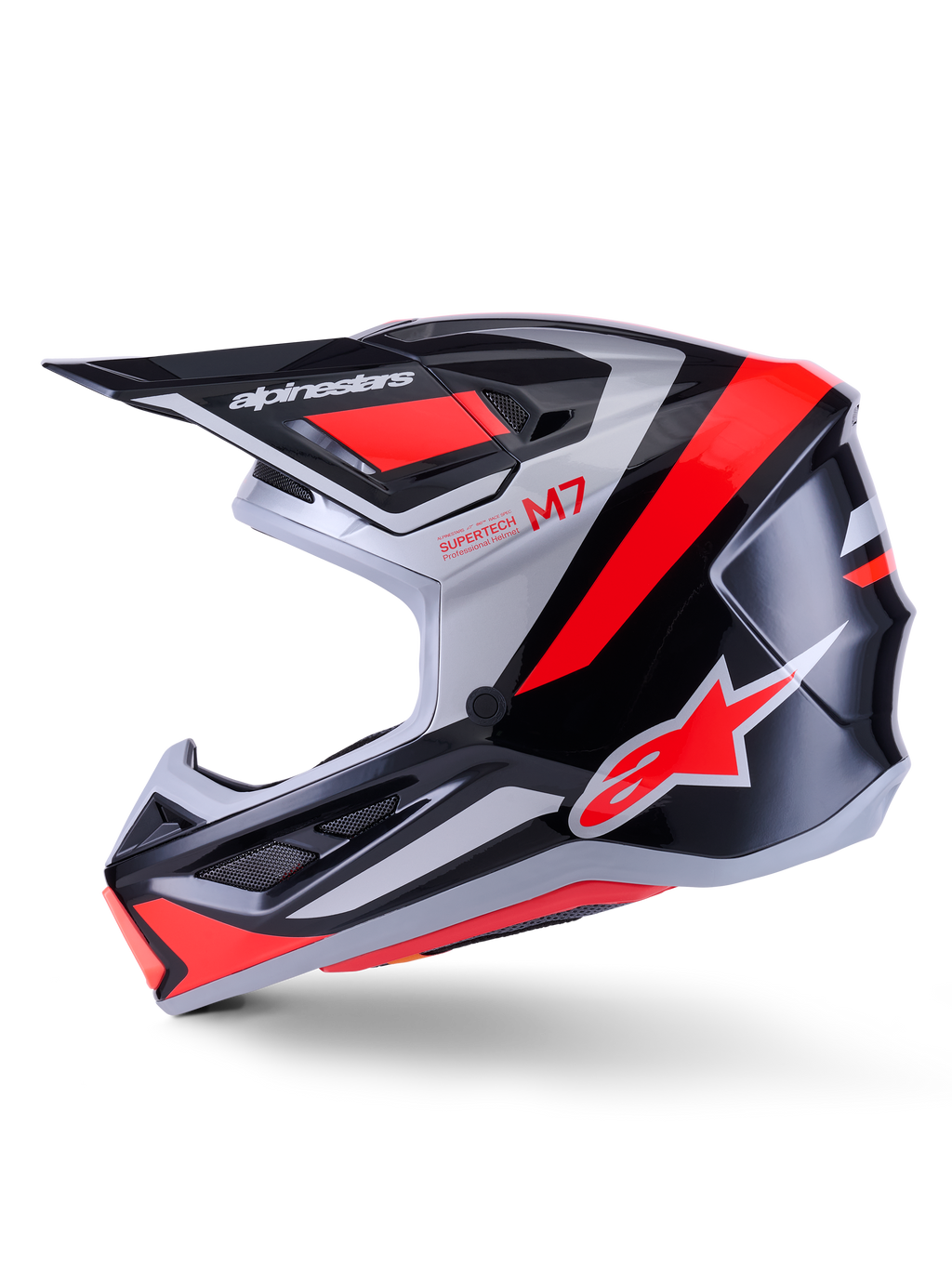 Alpinestars S-M7 Rise Helmet, Motocross Helmet, Black Silver and Red Fluo Glossy, side profile view featuring an aerodynamic composite shell, ventilated chin guard, and prominent peak with Alpinestars branding.