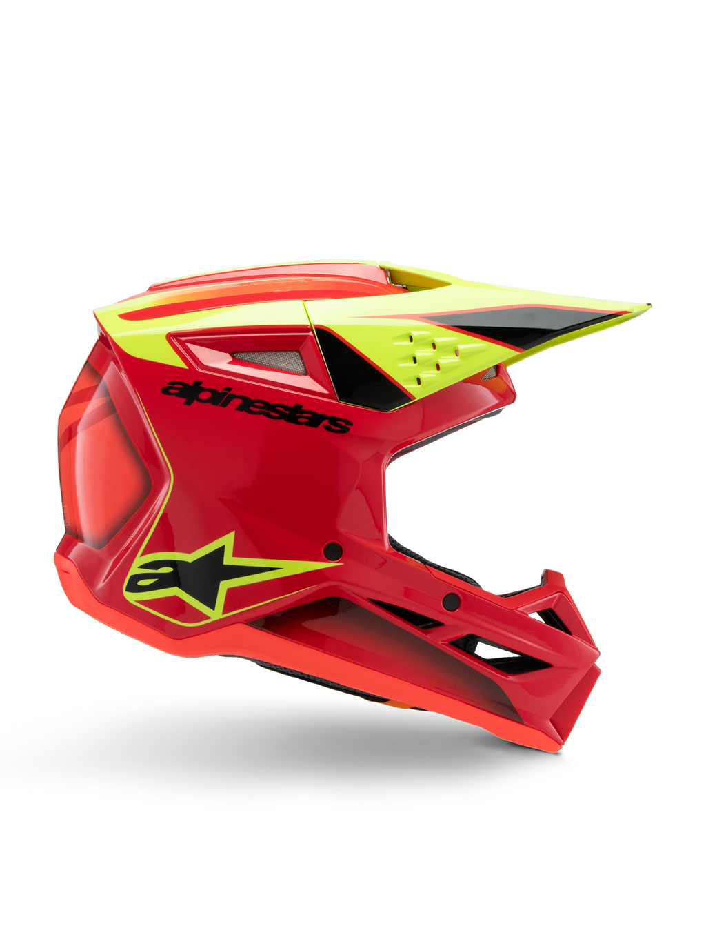 Alpinestars S-M3 Youth Fray Helmet, Motocross Helmet, Red Yellow Fluo and Black Glossy, side profile view showing a sleek aerodynamic design with integrated visor and prominent air vents, bold black branding on a vibrant red shell, optimized for youth off-road performance
