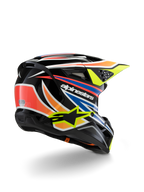 Alpinestars S-M3 Youth Wurx Helmet, Youth Motocross Helmet, Black with Vibrant Orange, Red, Blue, and Fluorescent Yellow Accents, rear three-quarter view showing aerodynamic shell and ventilation ports, glossy finish with bold Alpinestars branding.