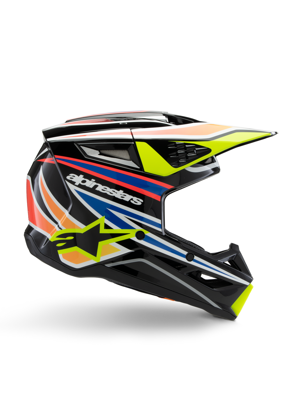 Alpinestars S-M3 Youth Wurx Helmet, Youth Motocross Helmet, Black with yellow, blue, red, and orange graphic stripes, side profile with aerodynamic visor and glossy finish, featuring white Alpinestars logo and yellow star graphic