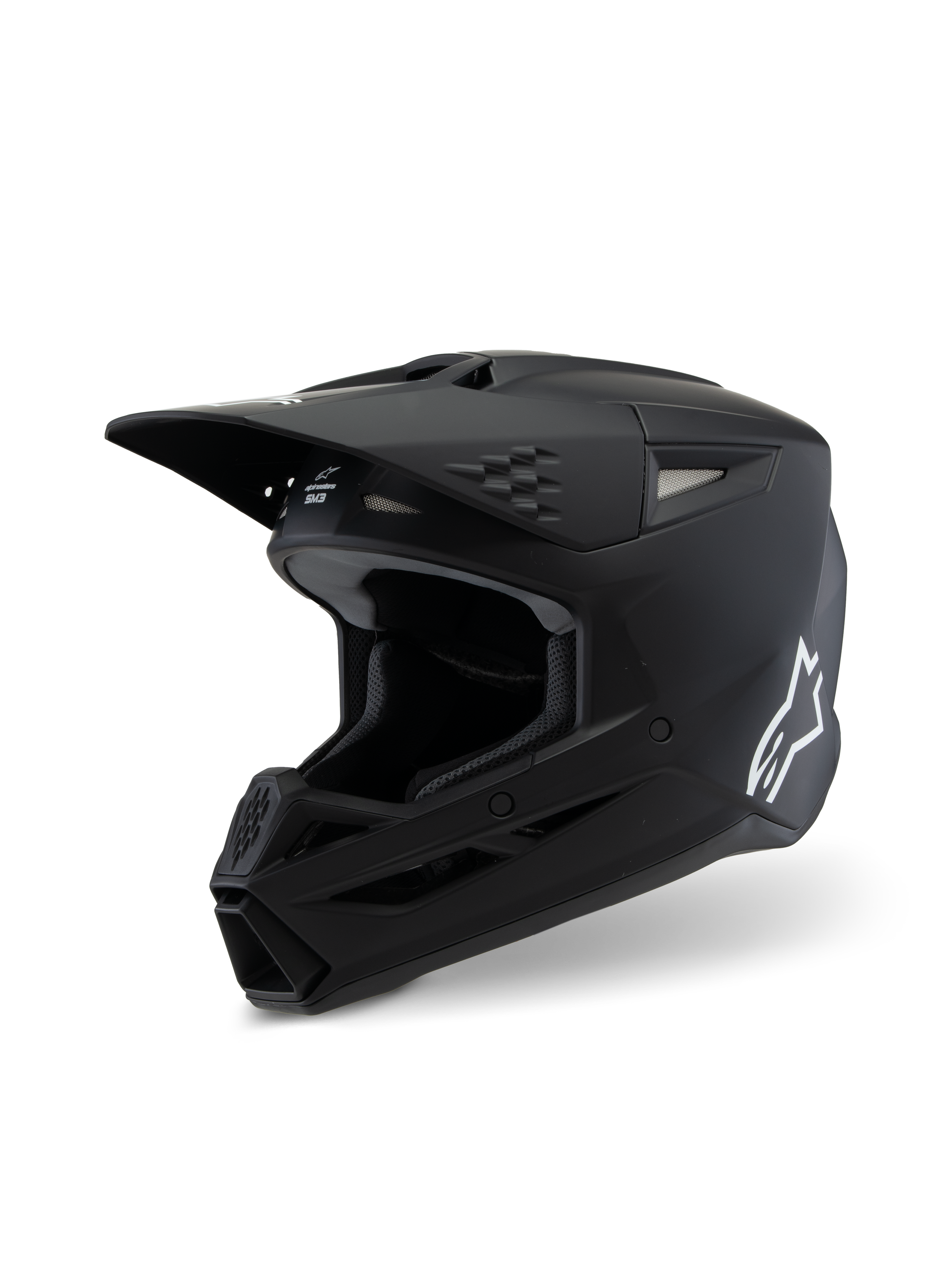 Alpinestars S-M3 Youth Solid Helmet ECE 22.06, Motocross Helmet, Matte Black, side profile view featuring a white Alpinestars logo, aerodynamic shell with ventilation ports and integrated visor, professional off-road head protection for youth riders