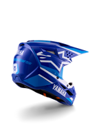 Alpinestars Yamaha S-M3 Youth Motocross Helmet, Blue and White Glossy, featuring bold Yamaha branding on the side and back, aerodynamic shell design with rear ventilation, youth-specific off-road head protection in a three-quarter rear view.