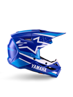 Yamaha S-M3 Youth Motocross Helmet, Blue and White Glossy, side profile view featuring bold Yamaha branding and Alpinestars star logo, geometric design with light blue accents, ventilated shell with long visor, ECE 22.06 certified off-road head protection
