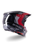 Alpinestars Honda S-M5 Helmet ECE, Motocross Helmet, Black Red Glossy, rear three-quarter view featuring Honda branding and Alpinestars logos, glossy finish with red and grey graphic accents, designed for off-road protection