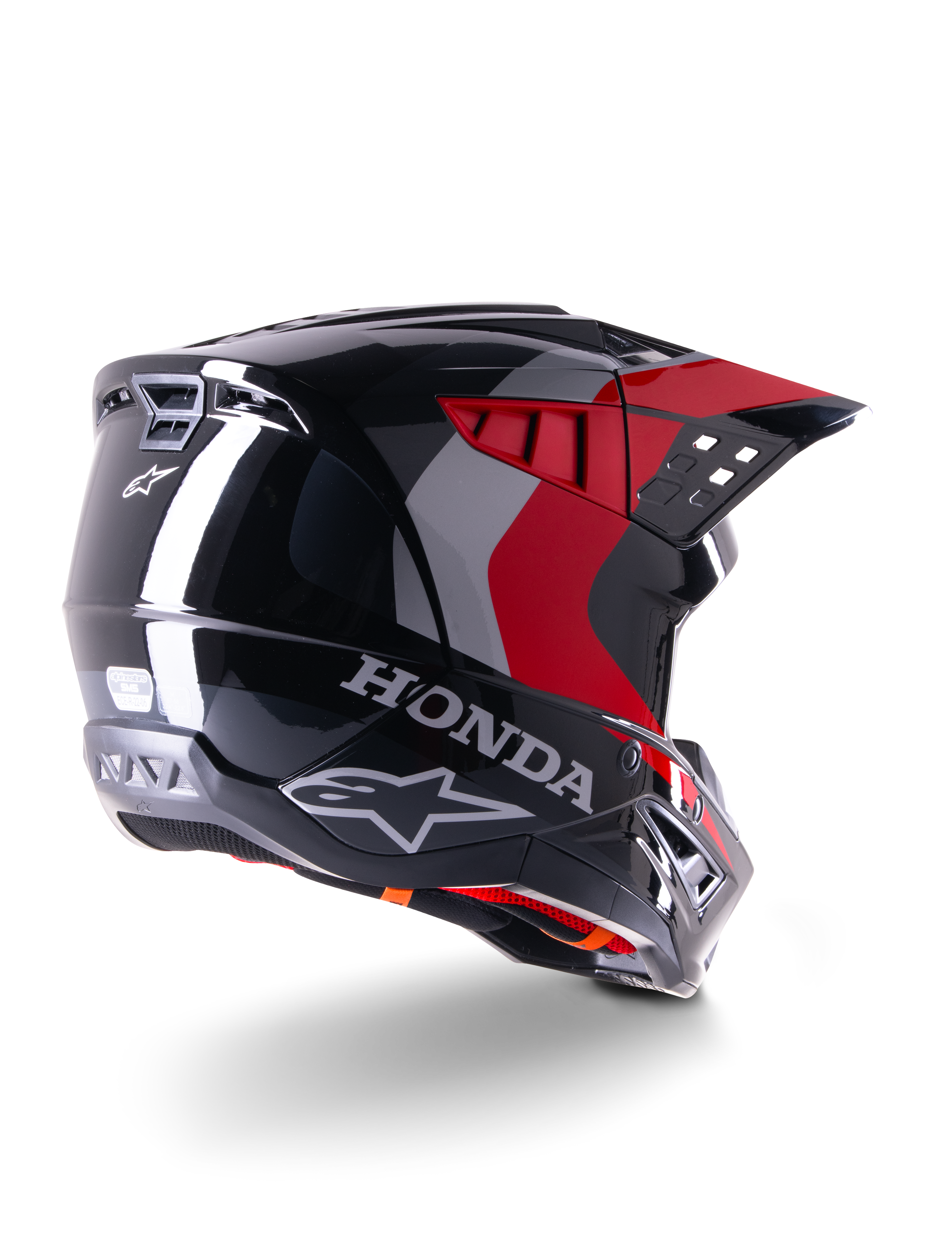 Alpinestars Honda S-M5 Helmet ECE, Motocross Helmet, Black Red Glossy, rear three-quarter view featuring Honda branding and Alpinestars logos, glossy finish with red and grey graphic accents, designed for off-road protection