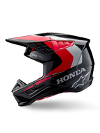 Alpinestars Honda S-M5 Helmet, Motocross Helmet, Black Red and Silver Glossy, side profile view with Honda branding and Alpinestars star logo, sleek design with integrated peak and ventilation ports for off-road performance
