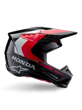 Honda S-M5 Helmet, Motocross Helmet, Black Red Glossy with white and silver accents, side view featuring Honda and Alpinestars logos, aerodynamic design with visor and multiple ventilation ports, professional off-road protective gear