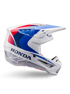 Alpinestars Honda S-M5 Helmet ECE, Motocross Helmet, White Blue and Red, side profile view, aerodynamic design with integrated visor, multiple ventilation openings, glossy finish, bold Honda branding and Alpinestars logo