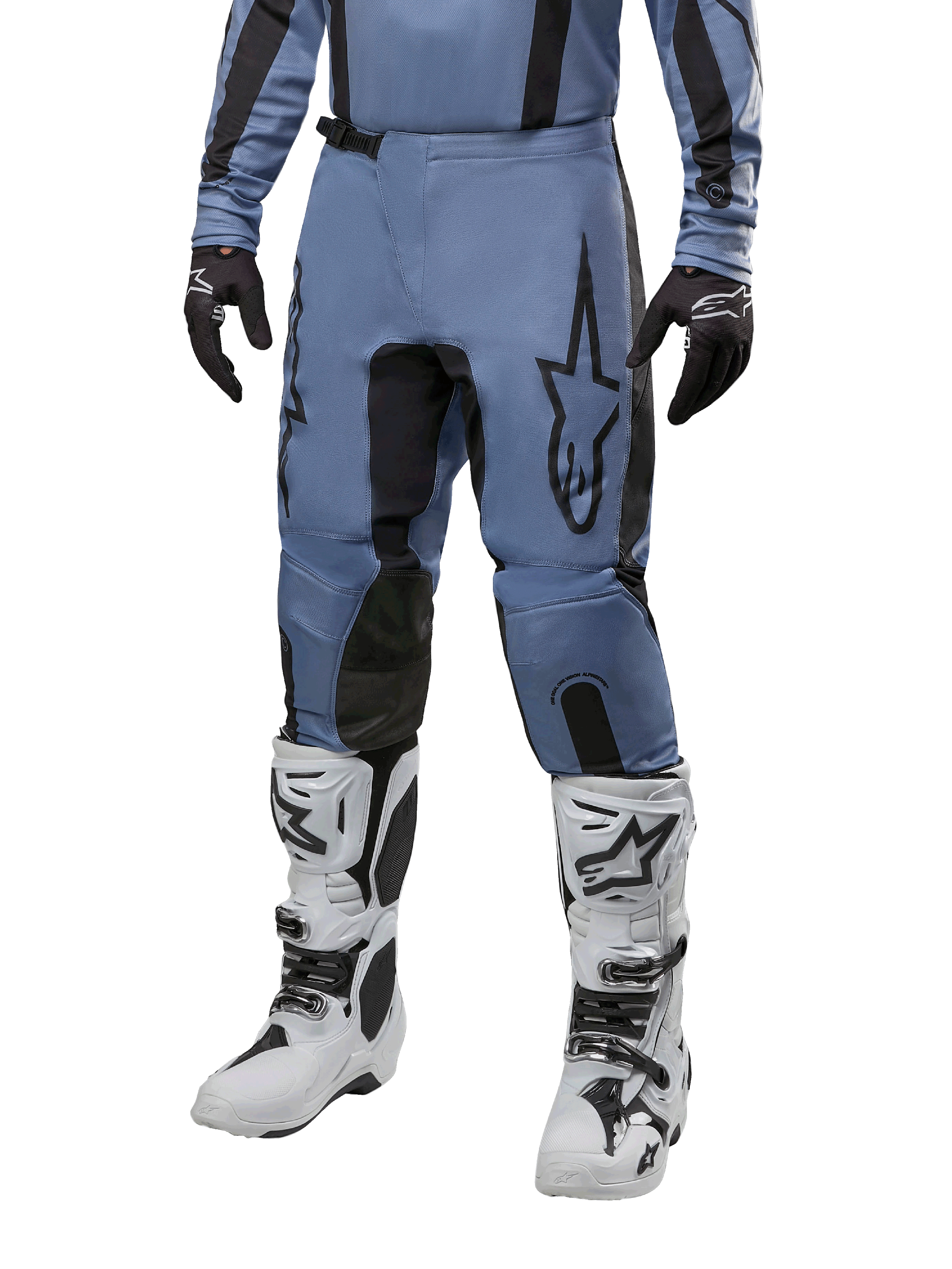 Alpinestars 2024 Fluid Lurv Pants, Motocross Pants, Light Blue and Black, worn with matching long-sleeve jersey and white motocross boots, featuring a prominent black star logo on the thigh and reinforced inner knee panels, front view on white background