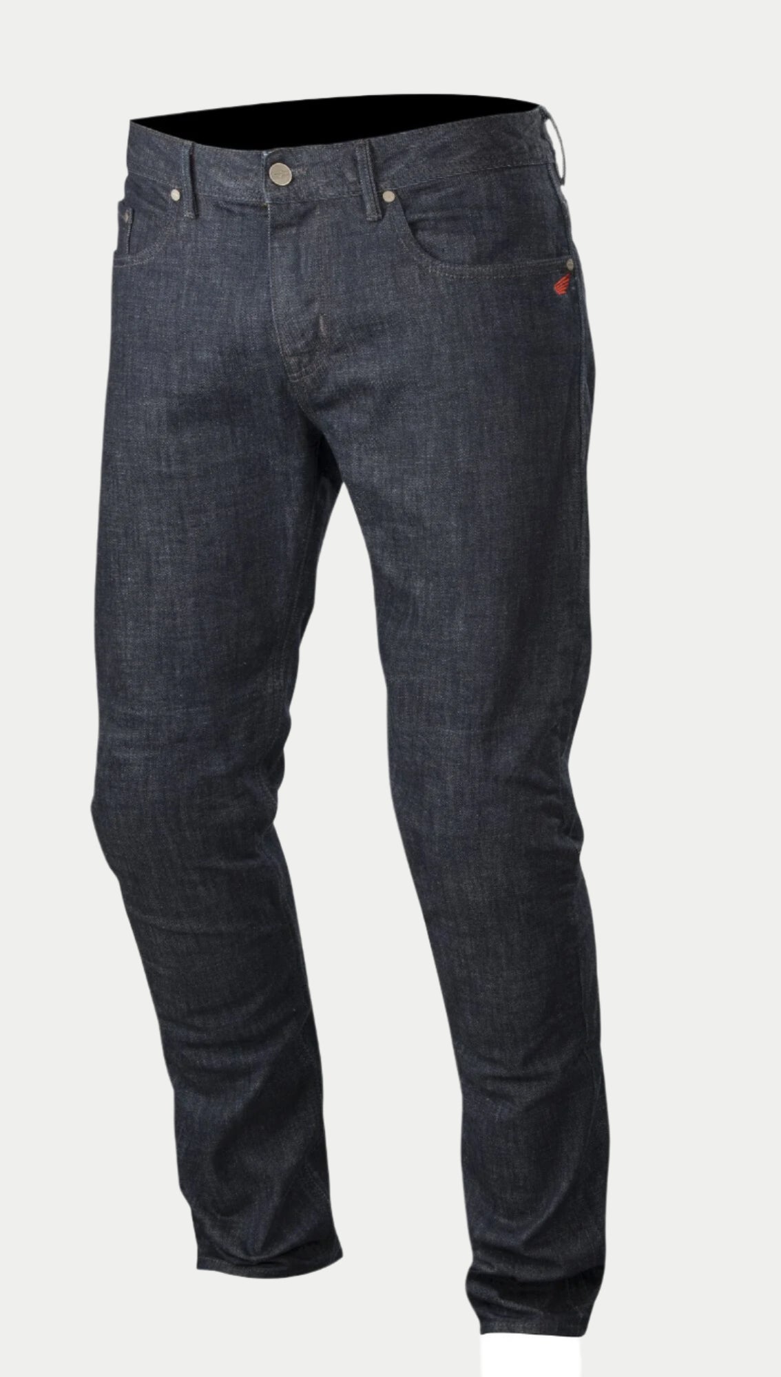 Alpinestars Copper Denim Pants, Motorcycle Riding Jeans, Dark Blue, featuring a regular straight fit, classic five-pocket design with a small red logo accent on the pocket, and pre-shaped leg construction for urban riding.
