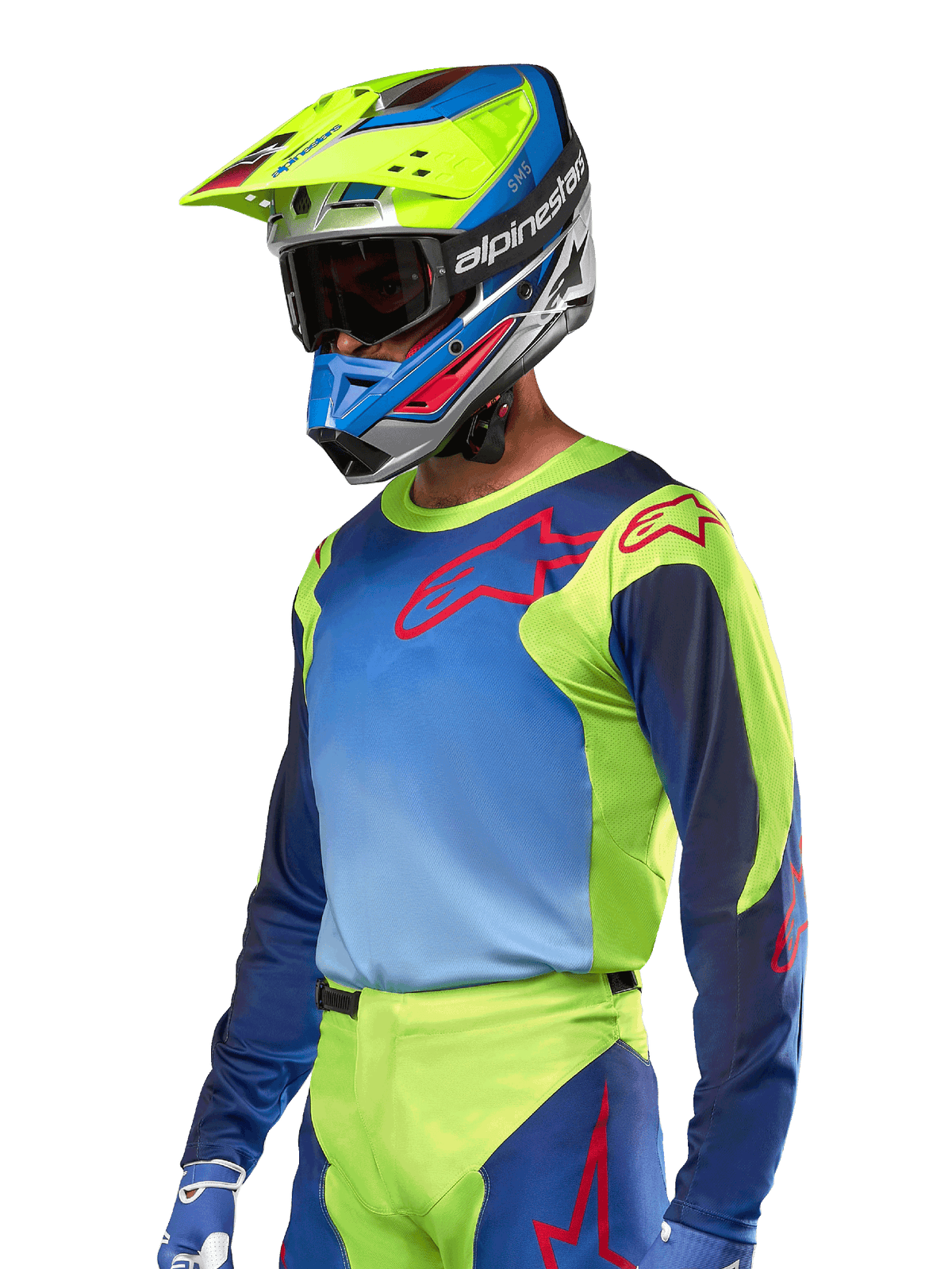 Alpinestars 2024 Racer Hoen Jersey, Motocross Jersey, Yellow Fluo and Blue Night Navy with red logos, worn with a matching yellow, blue, and red helmet and blue gloves, vibrant gear for off-road racing