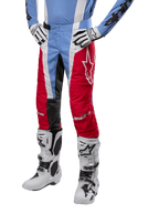 Alpinestars 2024 Techstar Ocuri Pants, Motocross Pants, Light Blue, Mars Red and White, worn with light blue jersey and white boots, featuring the star logo on the thigh and reinforced knees, complete off-road racing gear