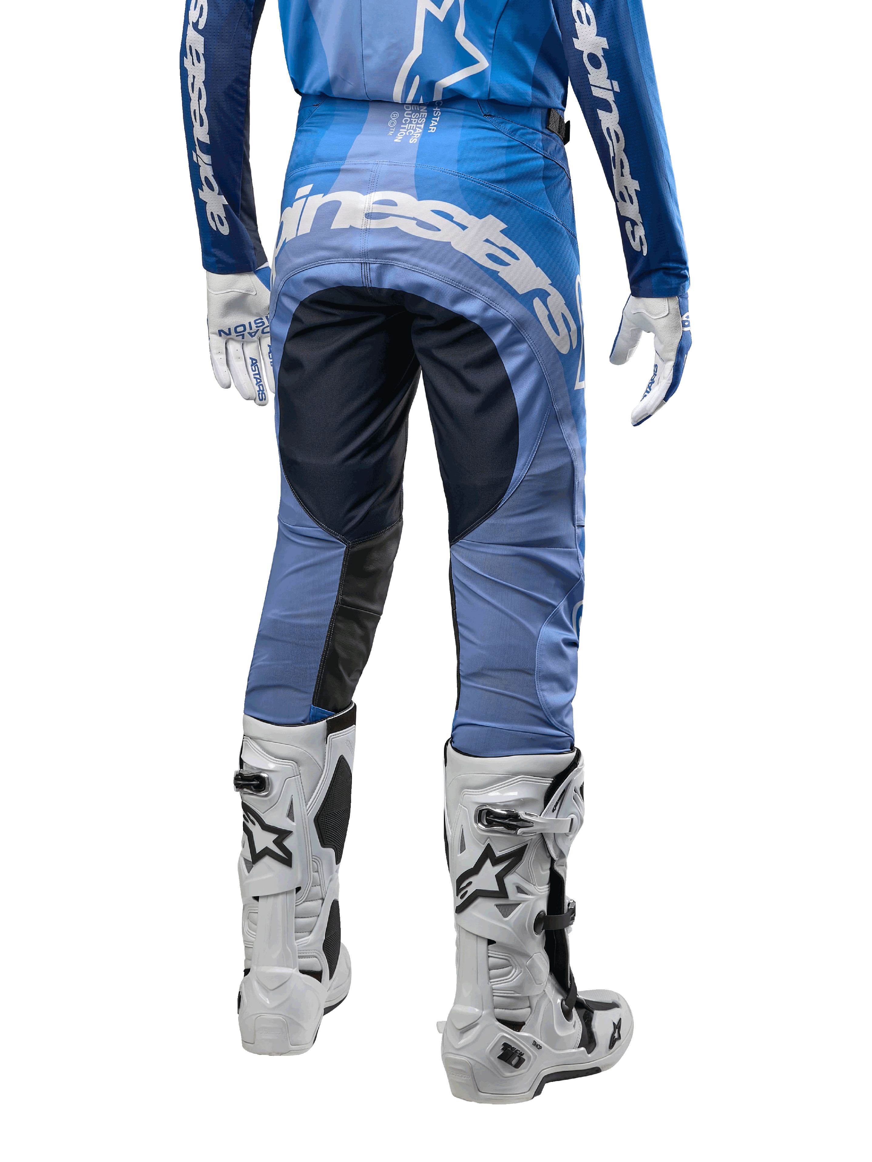 Alpinestars 2024 Techstar Pneuma Pants, Motocross Pants, Dark Navy and Light Blue, rear view featuring bold white branding on the seat and reinforced black panels, paired with white Tech 10 motocross boots.