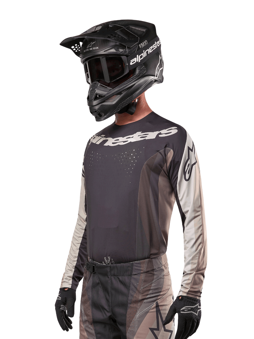 Alpinestars 2024 Techstar Pneuma Jersey, Motocross Racing Jersey, Dark Sand and Iron Dust Gray, long-sleeved performance top with laser-cut perforations and white branding, worn with matching pants and black helmet, athletic fit for off-road riding.
