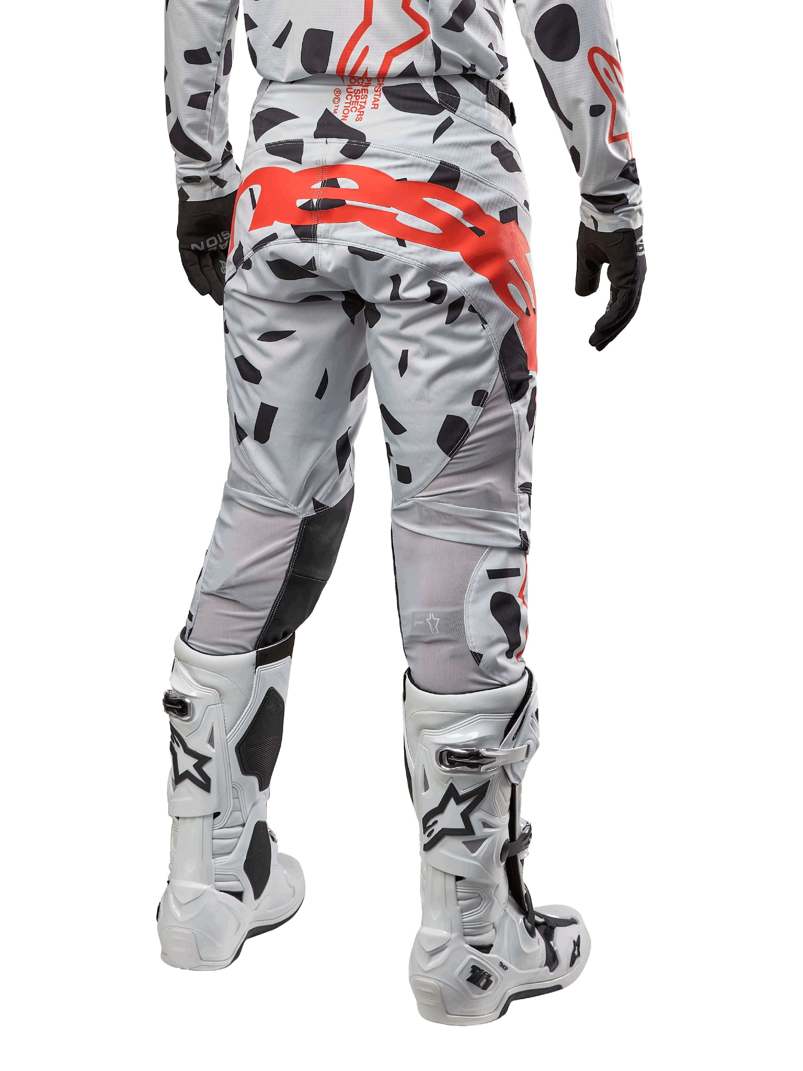 Alpinestars 2024 Techstar Rantera Pants, Motocross Pants, Haze Gray Camo, featuring black camo patterns and a large red Alpinestars logo on the seat, rear view worn with white boots and matching racing gear