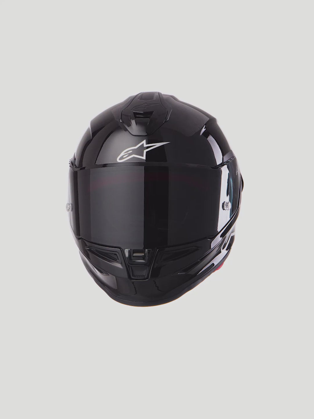 Alpinestars S-R7 Solid Helmet, Motorcycle Racing Helmet, Glossy Black, Carbon Composite Construction, ECE 22.06 Certified, featuring white Alpinestars logo and tinted visor